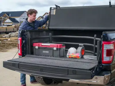 AMP Research - Bed Xtender HD Sport color Negro para F-150 / Lobo / Tundra - Image 23