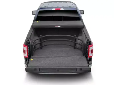 AMP Research - Bed Xtender HD Sport color Negro para Hilux  05 - 26 - Image 9